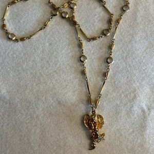 Kirks Folly angel necklace with dangle star and moon and crystals throughout